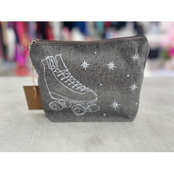 Neceser con silueta patines...